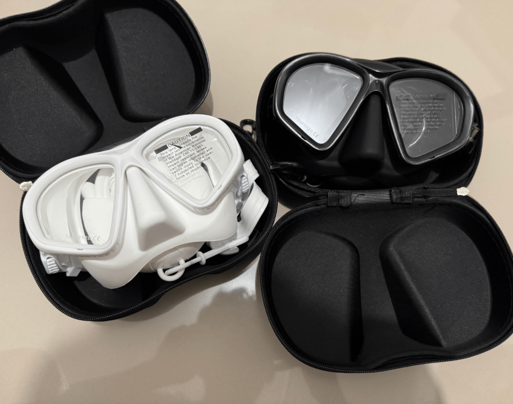black and white snorkel gear set including low-volume masks and snorkel for freediving